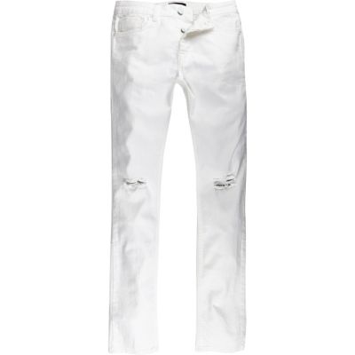 White ripped Sid skinny jeans